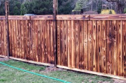 Забор из обожженной древесины
